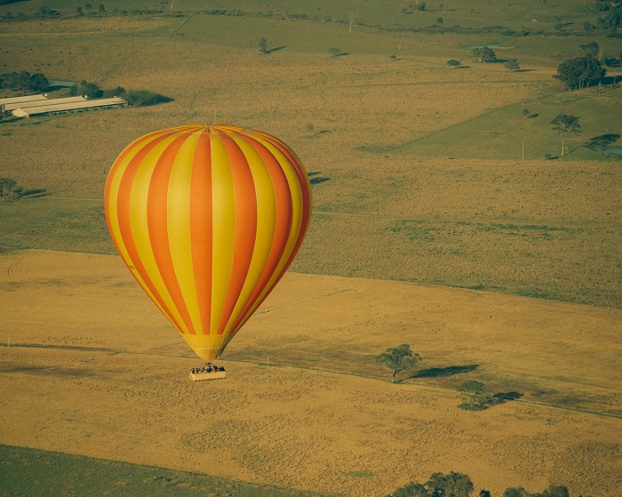 Take a hot air balloon and look at the city from God's perspective